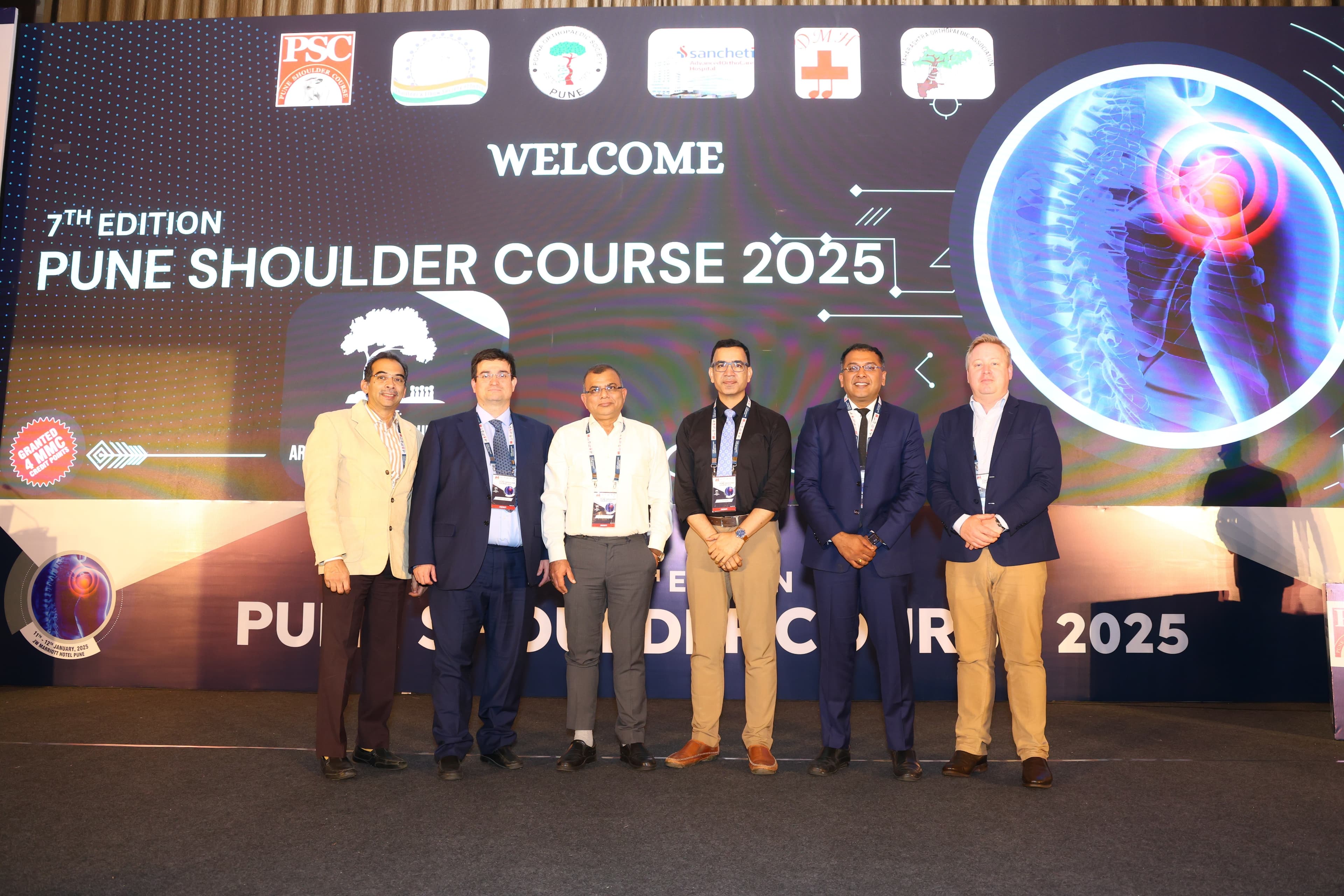 Dr. Sanjay Trivedi receiving award at Ahmedabad Orthopaedic conference